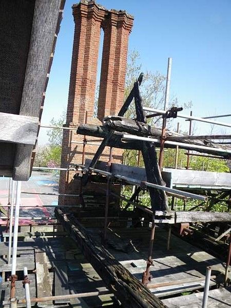 Scaffolding supporting the fire-damaged timber frame