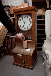 Staff clocking in and out machine. Photo: Jane Baker