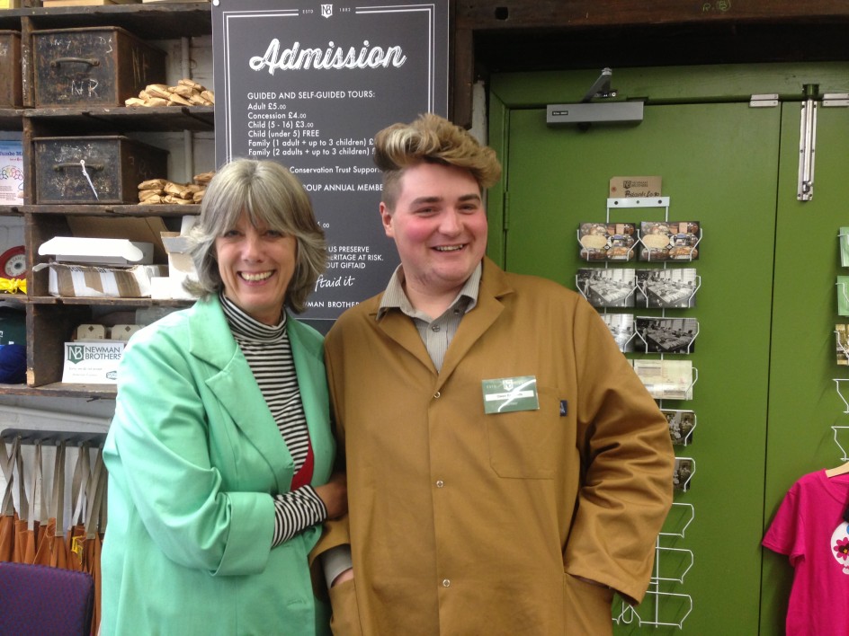 Volunteers Owen and Mary in the shop