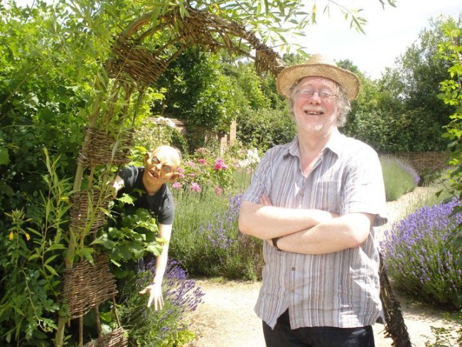 Our first Literary Bus meeting was at Blakesley Hall in 2010. This picture became synonymous with the project, with Gollum peering behind Chris in Blakesley's beautiful gardens. © Anne-Marie Hayes